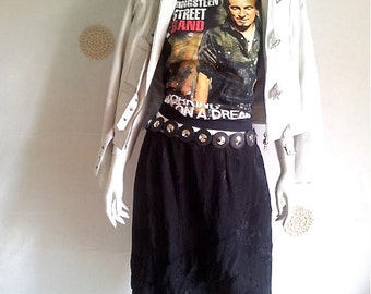Vintage skirt 80s, black color, polyester, lined, us size 14, excellent condition.