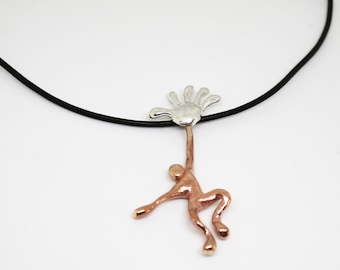 U-Mano: bronze and silver pendant