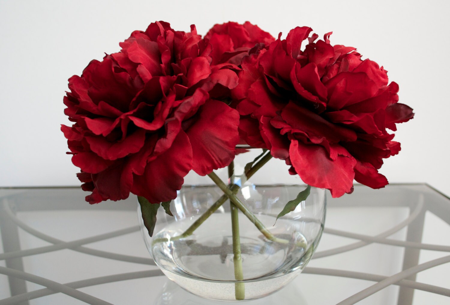 Classy Red Peonies in Round Glass Vase with Faux Water