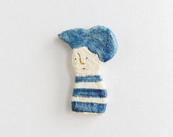 And the uebi clay brooch