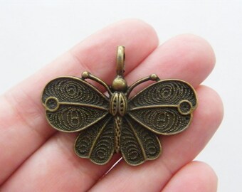 2 Butterfly pendants antique bronze tone BC27