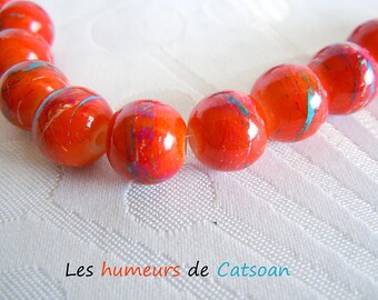10 "graffiti" pattern on 10mm brick red glass beads / bead decorated