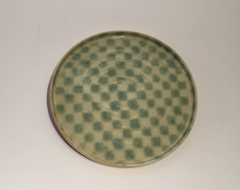 Green and cream checked plate thrown on the wheel in stoneware clay