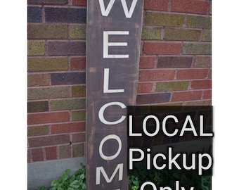 Welcome Sign LOCAL residents pick up listing