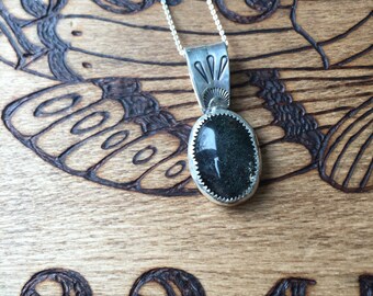 all the land glimmered - included quartz pendant with stamped detail