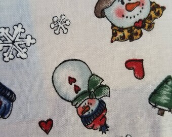 Vintage Christmas cotton print with snow boots, Christmas trees, snowflakes on white background. Measures 1yd by 44". Sale by the yard (BTY)