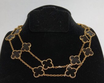 Van Cleef and Arpels necklace sale, 20 motifs. Stone is Black Onyx.