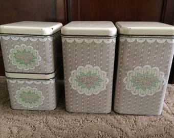 Vintage canister set. 1980's shabby and lacy set for kitchen counter or pantry storage.