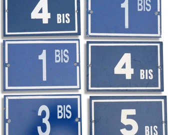 Plate metal house number "BIS" - french door number.