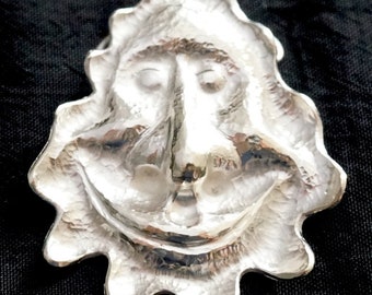 Silver pendant, counterpoint face