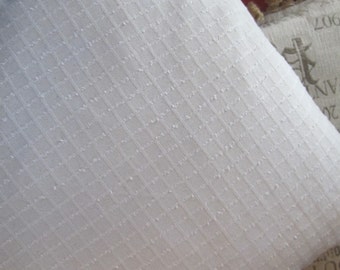 Throw pillows in off-white/beige windowpane textured cotton by Robert Allen in four sizes