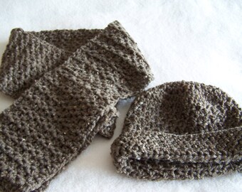 Grayish brown colored infinity scarf with matching hat.