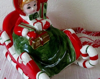Vintage 1950s Mid Century Lefton Shopper Christmas Girl Riding in Candy Cane Sleigh With Packages MUSIC BOX