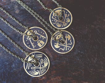A Solid View - brass shield necklace