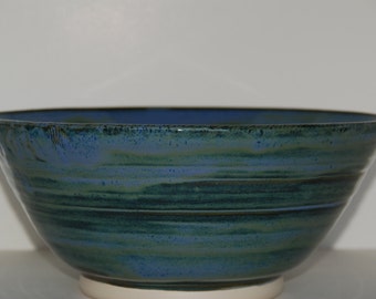 Large handmade pottery bowl. Large handmade bowl with shells.