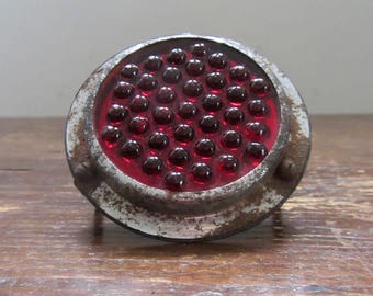 Vintage reflector with pomeglanate-like glass gem