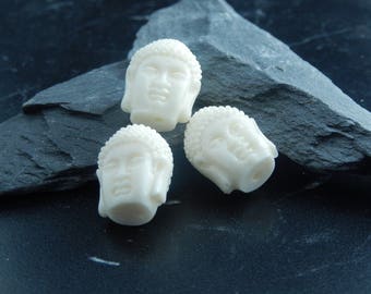 set white Buddha head beads of 2