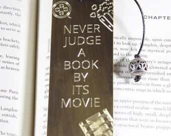 Never judge a book by its movie, antiqued copper bookmark, antiqued brass bookmark