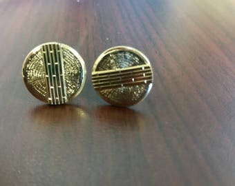 Round gold tone cuff links