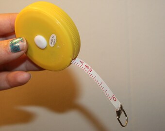 retractable tape measure,retractable measuring tape,retractable tape,sewing tape measure,measuring tools,measuring device,sewing tape