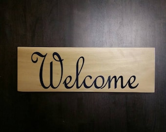 Welcome wooden sign, vinyl lettering