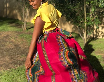 Fits size XL to 2X Hot Pink dashiki print waistcape!