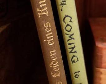 A nice set of 2 small, decorative, hardcover books, Coming to the King and Das Leiden eines Knaben - Meyer.