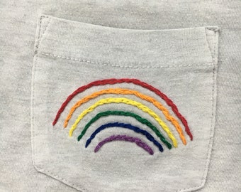 white rainbow pocket shirt