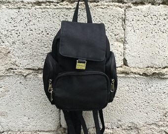 Vintage Backpack/ 90s/ five pockets/ black color/ adjustable straps/ nylon/ 20 cm x 17 cm