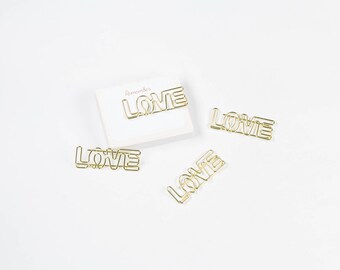 Gold love paperclips. 2 pieces.