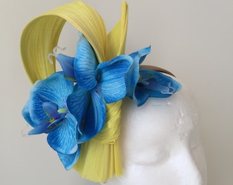 NEW yellow fascinator with blue orchid flowers on a headband! One only!