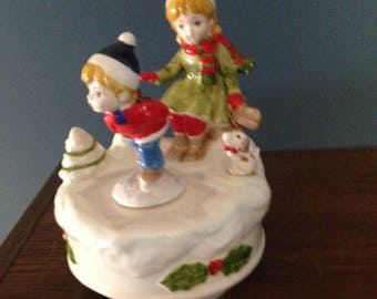 1038 Ceramic Children Playing in Snow