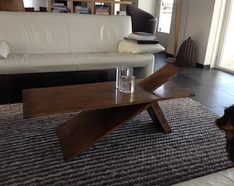 Coffee table with hanging sheet