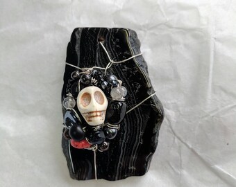 Where The Skulls Are wire-wrapped black agate pendant