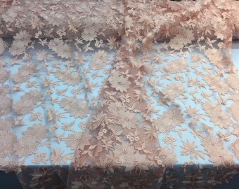 Peach flower design embrodier on a mesh lace -yard