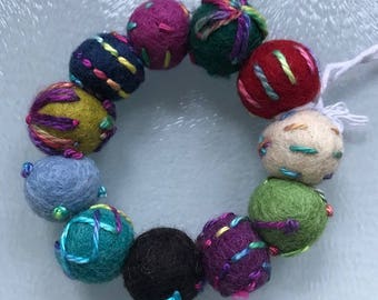Embroidered wool felt bead bracelet