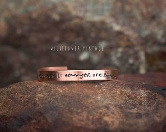 She is clothed in strength and dignity Copper Cuff Bracelet | Hand Stamped Christian Bible verse Proverbs 31:25 Religious Gifts for Her