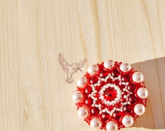 Round red brooch with swarovski elements