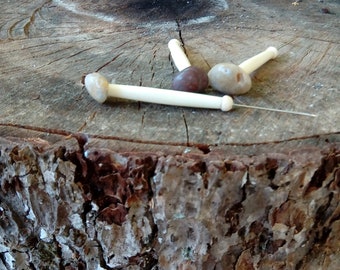 voodoo pins,stone voodoo pins,real bone pins,hoodoo pins,rock bone voodoo pins,hoodoo pins,ritual bone pins,pins for voodoo,pins for hoodoo