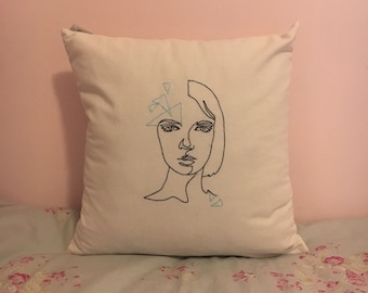 Hand embroidered pillow