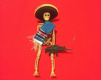 Blue Sarape day of the dead skeleton ornament with a gun #9