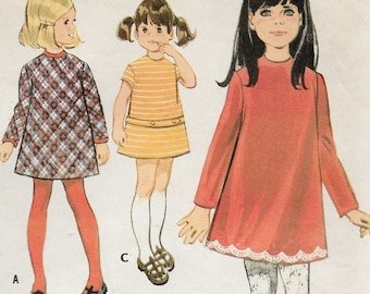 An A-Line, Collarless, Long or Short Sleeve Dress with Trim Variations Sewing Pattern for Children: Size 3, Breast 22" • McCall's 2212
