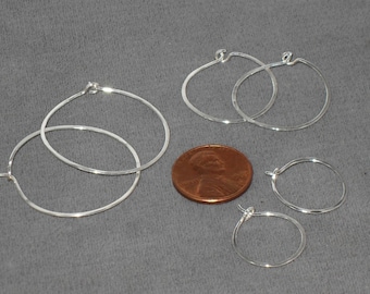 A Set of Sterling Silver Hoop Earrings
