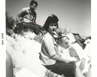 Vintage Snapshot "Sliding Down the Sand Dunes" Laughing Girl Beach Fun 1960 Found Vernacular Photo