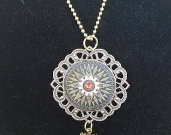 Steampunk inspired compass gear anchor filigree necklace