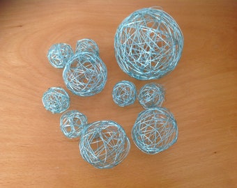 set of 10 green metal balls