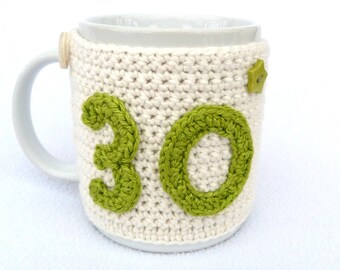 Handmade, 30th Birthday cream crochet mug cosy. Homewares, birthday gift, accessories, 30th birthday gift, crocheted, cup cosy, coffee cosy