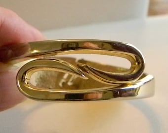Gold Tone Swirl Design Spring Bangle Bracelet