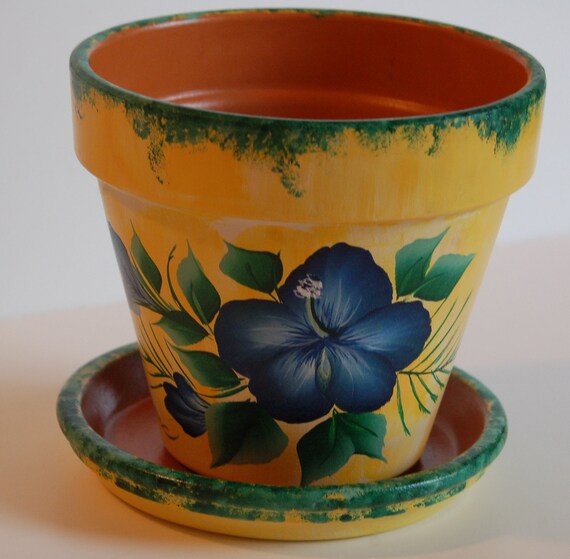 6 or 8 Hand Painted clay  flower pot 