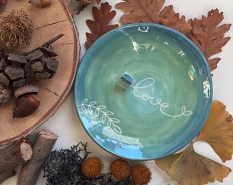 Ceramic saucer with home-love